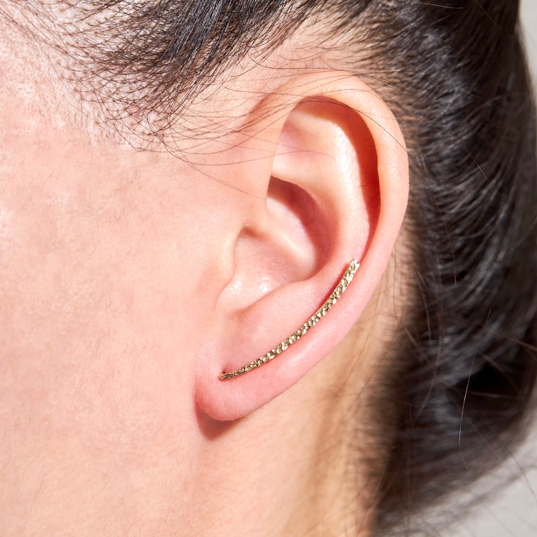 Rod the ear climber in yellow gold on ear